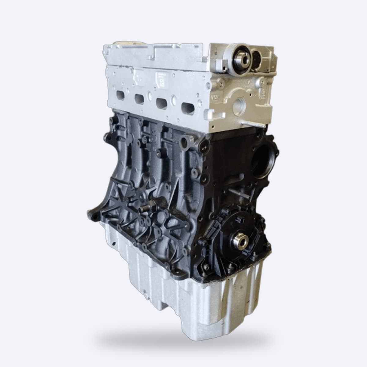 Renoverad fyrcylindrig dieselmotor, exempelbild på utbytesmotor